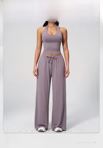 Detail of lavender ribbed yoga set with halter neck top and high-waist drawstring pants