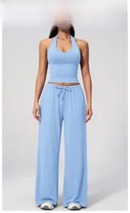 Sky blue yoga set featuring a U-neck cropped tank top and drawstring wide-leg pants