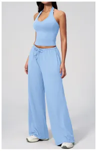 Light blue yoga set featuring a halter backless top and drawstring wide-leg pants