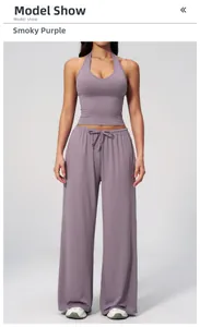 Detail of smoky purple two-piece yoga set with racerback top and drawstring pants