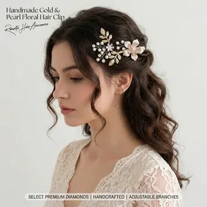 Elegant gold flower bridal hair clip with pearls and rhinestones on a female model