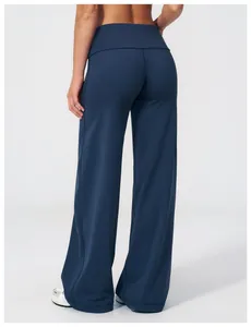 Vue arrière du pantalon de yoga bleu marine à taille haute et jambe large pour femmes