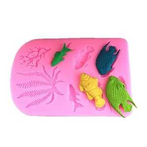 Pink silicone ocean series mold with sea fish, seaweed, and coral for DIY fondant cakes