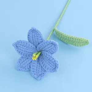 Handmade crochet light blue lily flower with green leaves for home decoration
