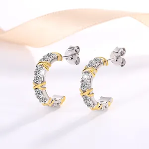 Orecchini incrociati in argento S925 con pietre moissanite in finitura oro e argento