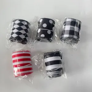 Set of 5 assorted decorative Christmas ribbons with stripes, dots, and plaid patterns
