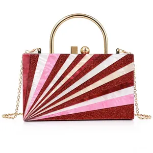Chic acrylic clutch bag with red white striped patterns and gold metal handle
