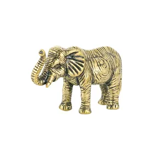 Figurine éléphant en laiton doré avec trompe vers le haut et finition texturée vintage