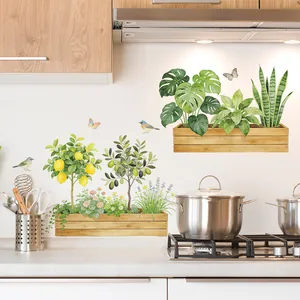 Detail of watercolor lemon tree and tropical plant wall stickers in a kitchen