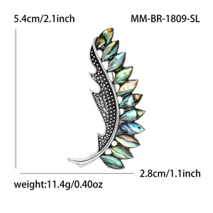 Vintage silver feather brooch with iridescent abalone shell inlay for clothing accessory