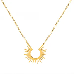 Detailed close-up of 18K gold-plated stainless steel necklace with sunburst pendant