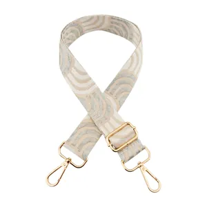 Bandoulière réglable avec motif vagues beige et argent et boucles dorées en métal