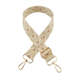 Bandoulière réglable tissée beige et or avec motif géométrique et mousquetons dorés