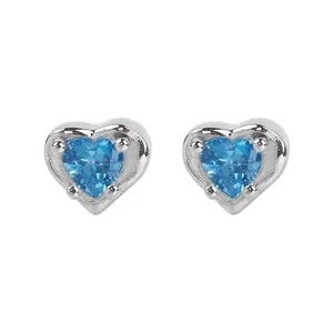 Silver heart earrings with light blue zircon stones in a three-prong setting