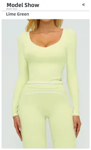 Dettaglio del top da yoga verde lime con cuciture a contrasto bianche per un look aderente