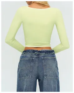 Top da yoga aderente a maniche lunghe verde lime con dettaglio scollatura bianca sul retro