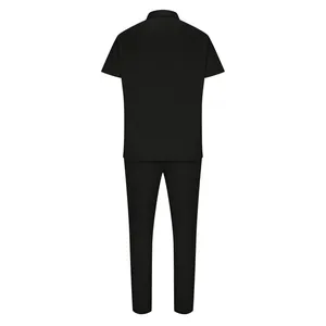 Rear view of black short-sleeved polo and trousers set in smooth knit fabric