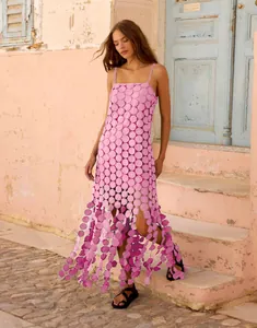 Pink laser-cut circular sequin slip dress featuring intricate hollow-out lace design