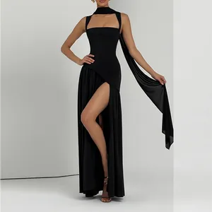 Detail view of structured black maxi dress with halter scarf and high side slit