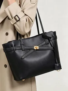 Classic black leather tote bag with gold twist lock and crossbody straps for women