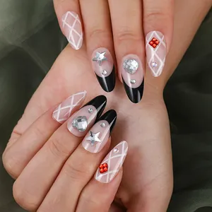 Macro detail of almond press-on nails with glitter diamonds and French tips