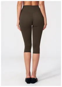 Rear view of high-waisted dark brown capri yoga pants showing ergonomic fit and seam detail