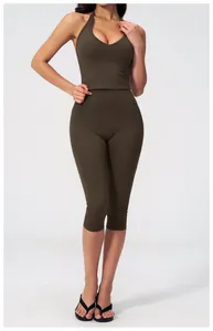 Detail of high waist brushed yoga shorts with moisture wicking matte brown fabric