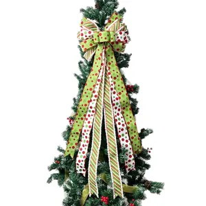 Classic red, green, and white polka dot Christmas tree topper bow decoration