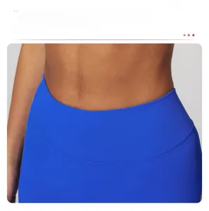 Detail of high-waist ribbed waistband on royal blue yoga leggings for tummy control