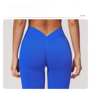 Macro shot of royal blue yoga leggings featuring jacquard texture and V-waist back design