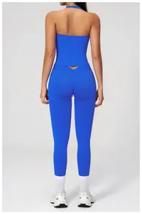 Detail of blue high-waist yoga pants with V-shaped rear cut to enhance the waistline