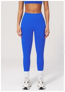 Blue high-waist seamless yoga pants and sports top set styled with white crew socks