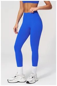 Detail of high-waist bright blue seamless yoga set with ribbed texture and slim fit design