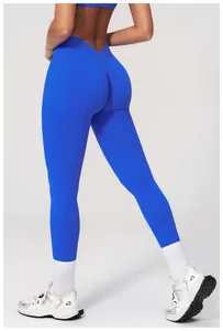 Detail of royal blue high-waist seamless yoga pants featuring a V-shaped booty lifting seam