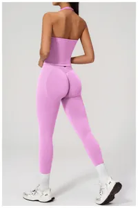 Rear view of high waist peach lift leggings showing sculpting V-shape fit in pink