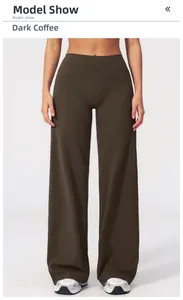 Close-up of high-waist wide-leg yoga pants in dark coffee with draped fabric texture
