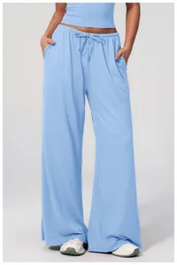 Light blue wide-leg lounge pants with elastic drawstring waist and side pockets