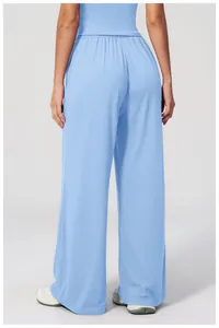 Back view of light blue wide-leg yoga pants featuring an elastic high waistband