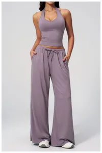 Detail of high-waist wide-leg lounge pants with adjustable drawstring in grey-purple