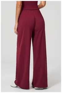 Rear view of loose dark wine red wide leg sports pants with elastic drawstring waist