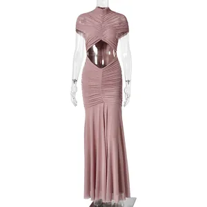 Detail of ruched dusty pink maxi dress featuring waist cut-out and high neckline
