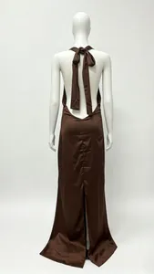 Detail view of brown satin halter dress featuring an open back and high slit