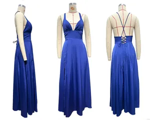 Detail of navy blue satin dress with deep V-neck, side slit, and lace-up back design