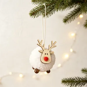 Handmade Christmas reindeer ornament with white wool felt ball body hanging on pine branch
