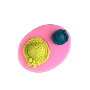 Pink silicone mold with two sizes of sun hat shapes for DIY fondant cake decoration