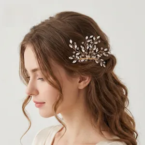 Detailed view of handmade bridal hair comb with pearls and adjustable rhinestone branches