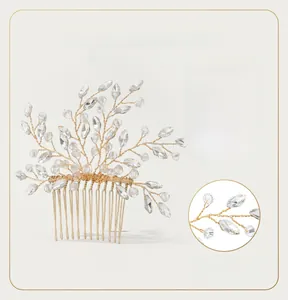 Detail of handmade rhinestone hair comb with adjustable gold vines for bridal styling