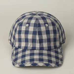 Detailed macro view of breathable blue and white gingham cotton linen baseball cap