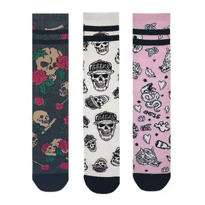 Three-pack of crew socks featuring Halloween skull, rose, and snake patterns