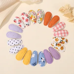 20-piece set of fabric-covered snap hair clips with floral and polka dot patterns for girls